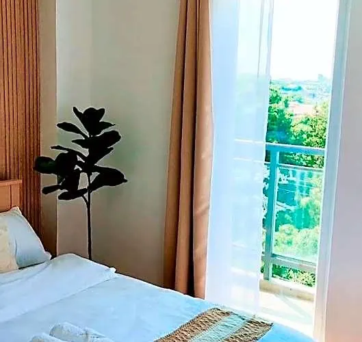 Paradise Realm Condotel 4* مانيلا