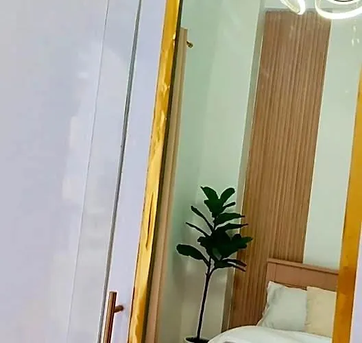 فندق Paradise Realm Condotel 4*